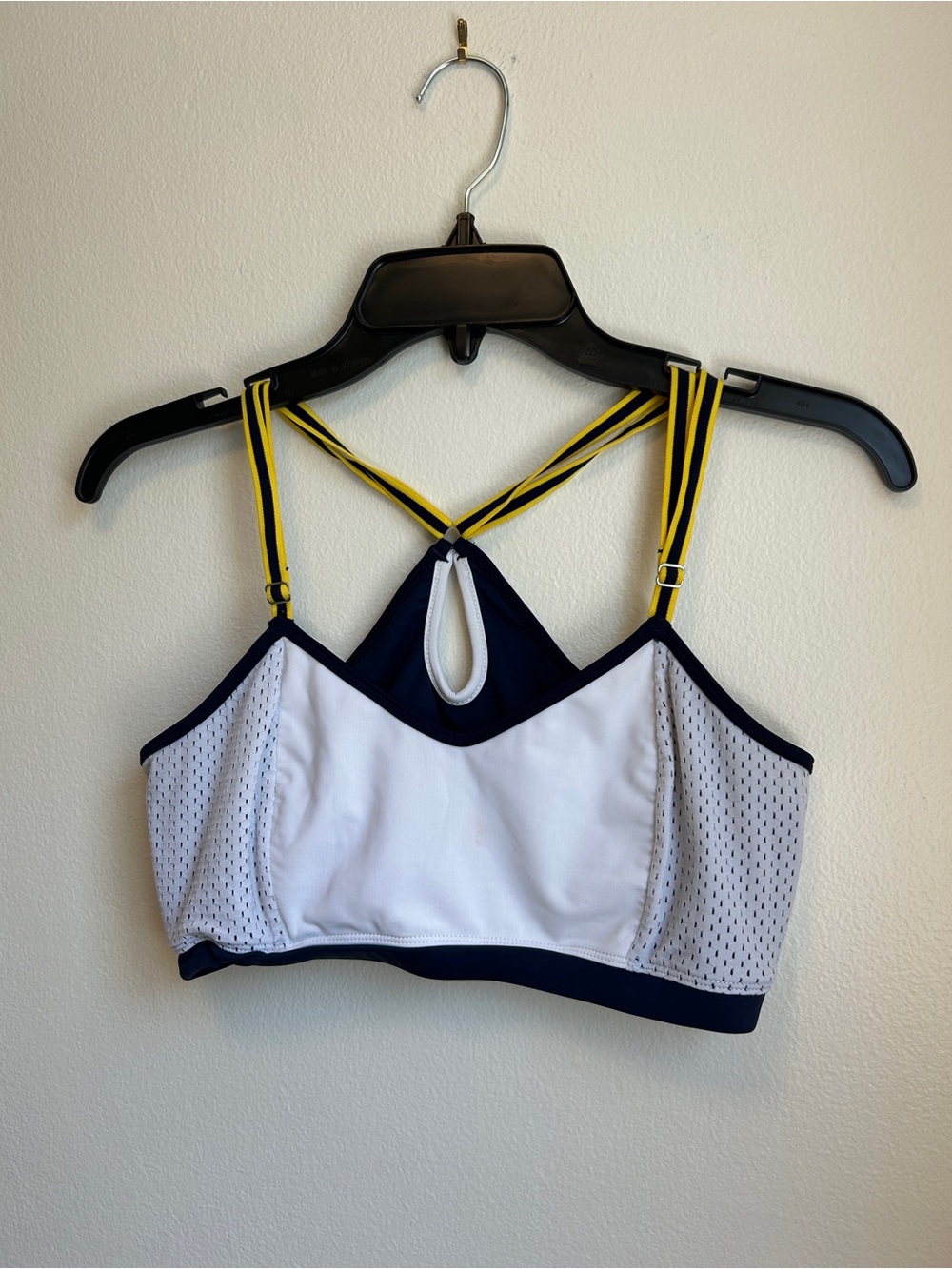 Women's White and Navy Strappy Sports Bra with Yellow Accent